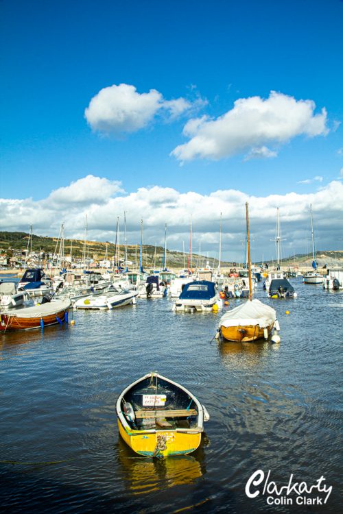 Lyme Regis harbour with boats